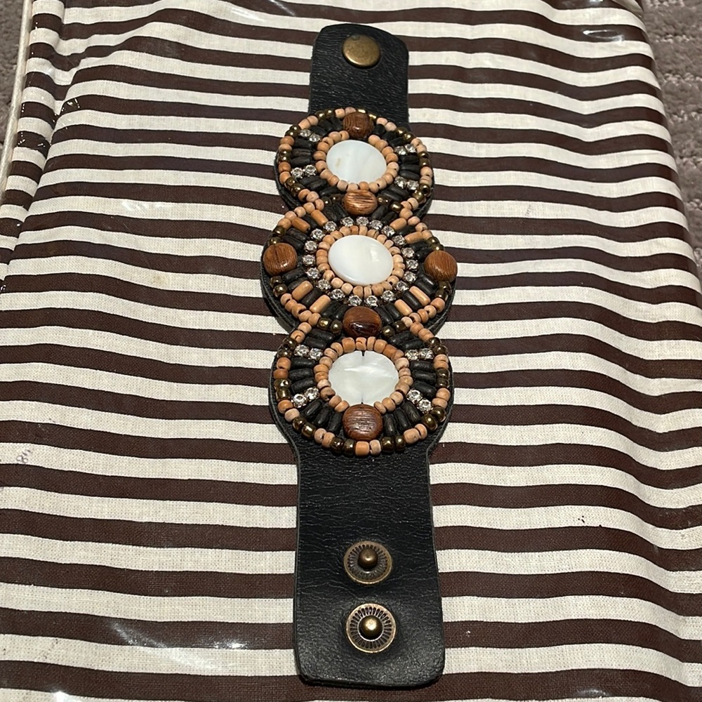 Ladies Tommy Bahama black leather beaded and rhinestone bracelet.